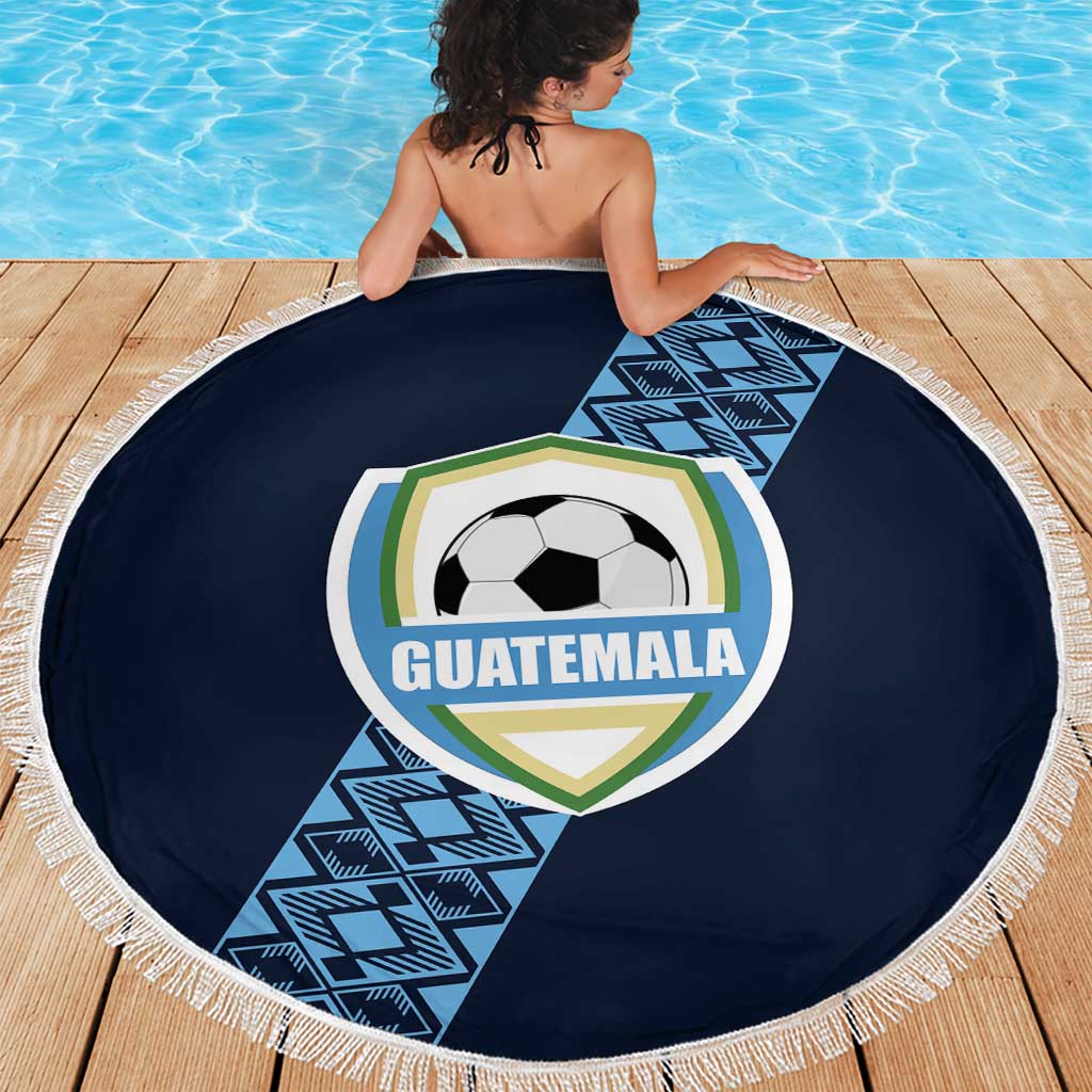 Round navy Guatemala football beach blanket with white fringe, crest and soccer-ball graphic on deck