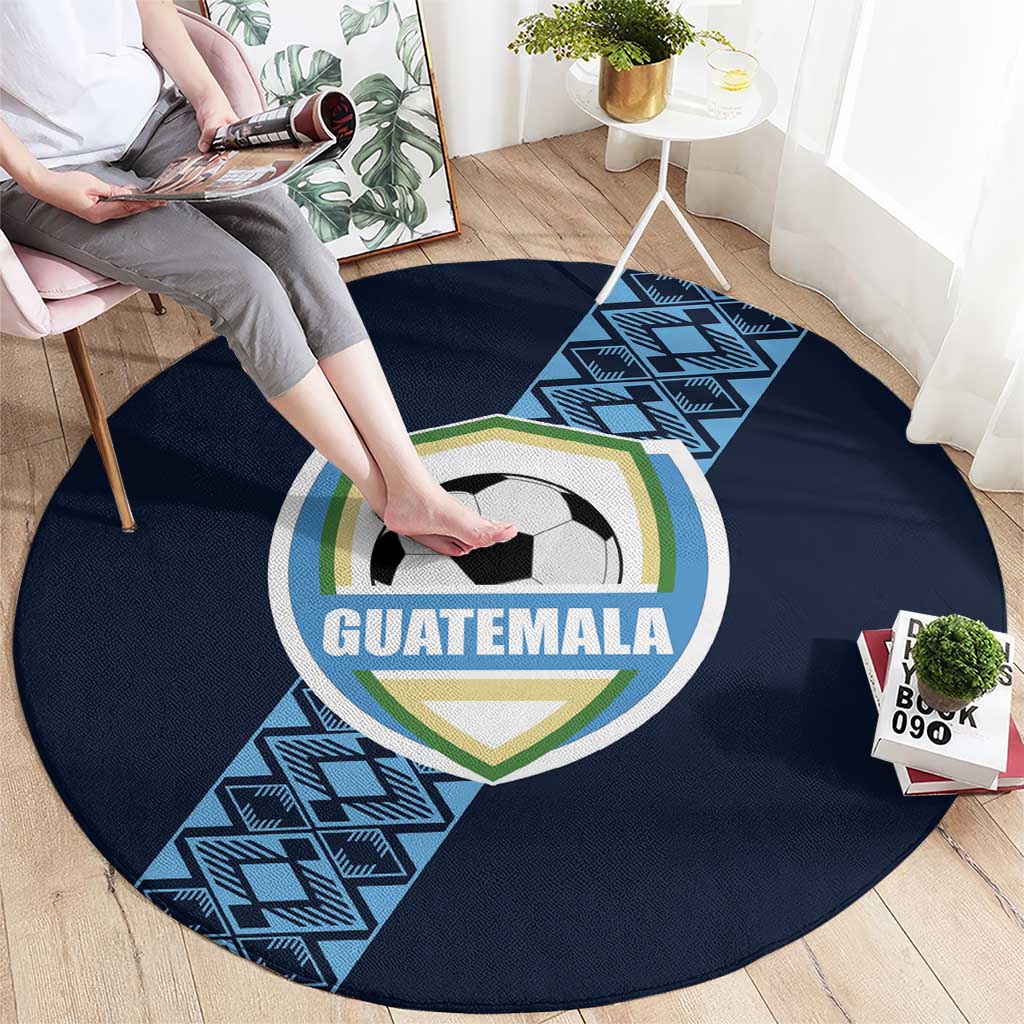 Round dark blue Guatemala soccer carpet with crest, ball graphic, and zigzag geometric border