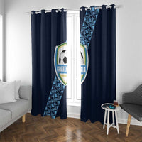 Navy window curtain panels with football emblem and diagonal geometric stripe, room view