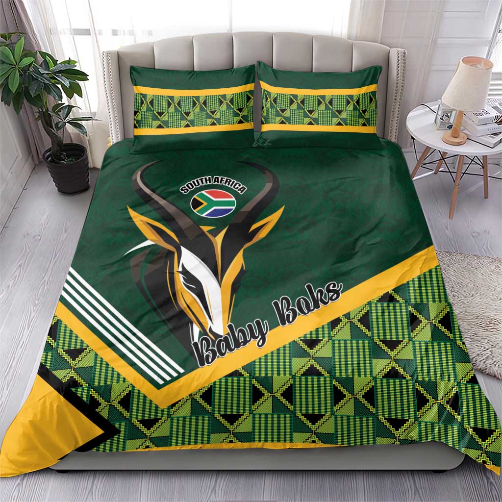 Green baby bedding set with South Africa rugby emblem and two matching pillowcases
