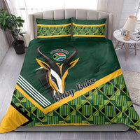Green baby bedding set with South Africa rugby emblem and two matching pillowcases