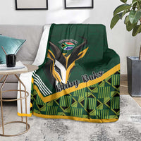 Green baby blanket with 'Baby Boks' emblem, plaid knit design and yellow trim