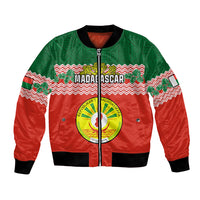 Red and green bomber jacket with Madagascar seal graphic, zip front, ribbed cuffs