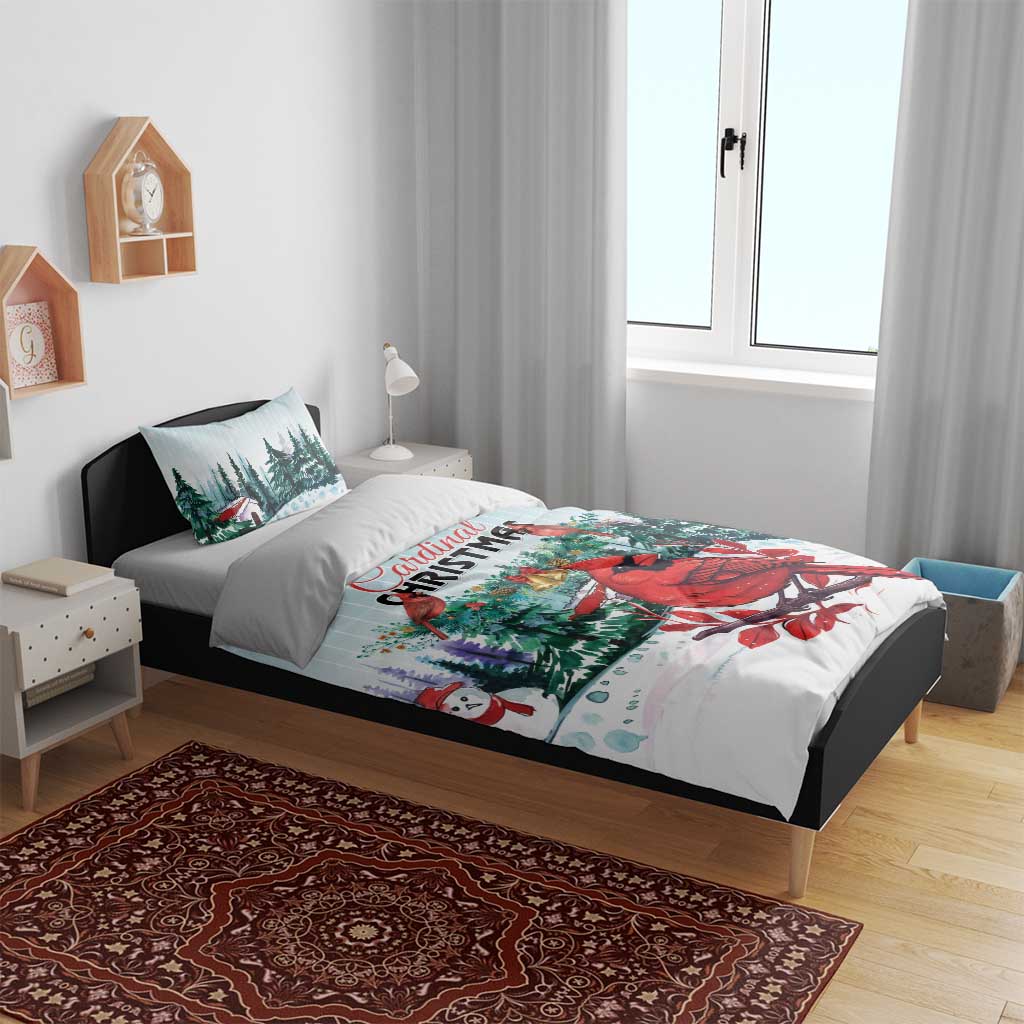 Mint Christmas bedding set showing red cardinal birds and evergreen trees on duvet