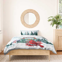 Mint Christmas duvet with cardinal bird artwork and forest scene, paired with pillow
