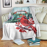 Cardinal Christmas blanket with red cardinals and evergreen foliage on mint blue-and-white.