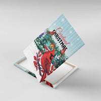 Tilted canvas wall art showing red cardinals, pine branches, bell, and "Cardinal Christmas"