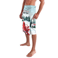 Mint Christmas swim shorts with cardinal artwork and customizable text panel, side view