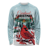 Mint long-sleeve Christmas shirt with cardinal, snowflakes, pine trees, and red text