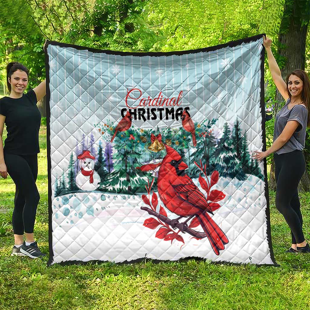 Rectangular light blue Cardinal Christmas quilt blanket with snowy trees and cardinal artwork