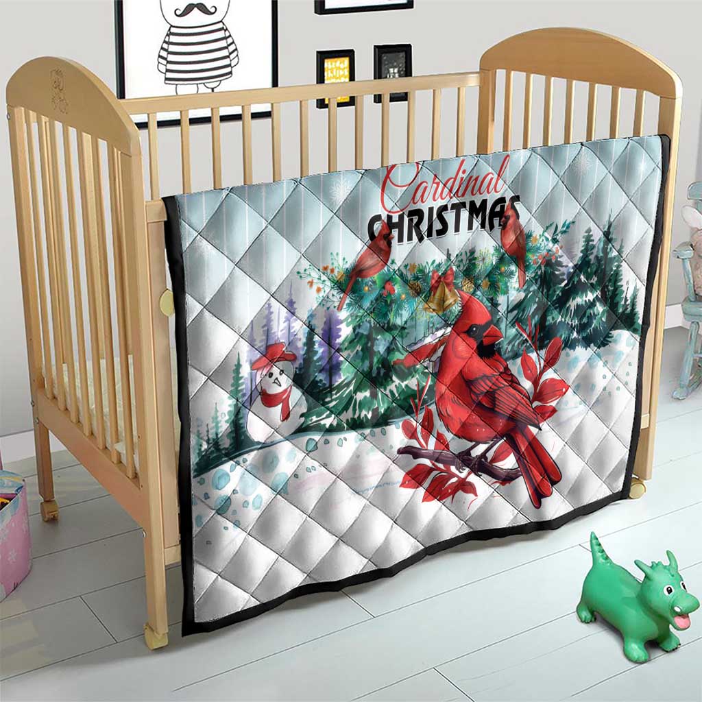 Light blue Cardinal Christmas quilt blanket on crib, red cardinal, snowman and evergreen trees