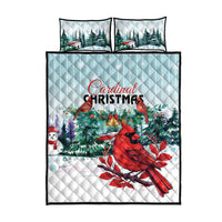 Mint quilt and two pillows set with cardinal, pine trees, and red floral accents
