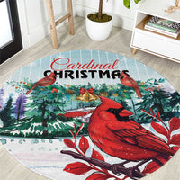 Round mint Christmas area rug with red cardinal birds and pine foliage print