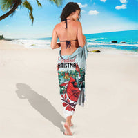 Mint sarong with red cardinal scene and Cardinal CHRISTMAS logo, wrap style