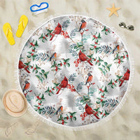 Round beach blanket in white with cardinal and holly pattern, fringed edge