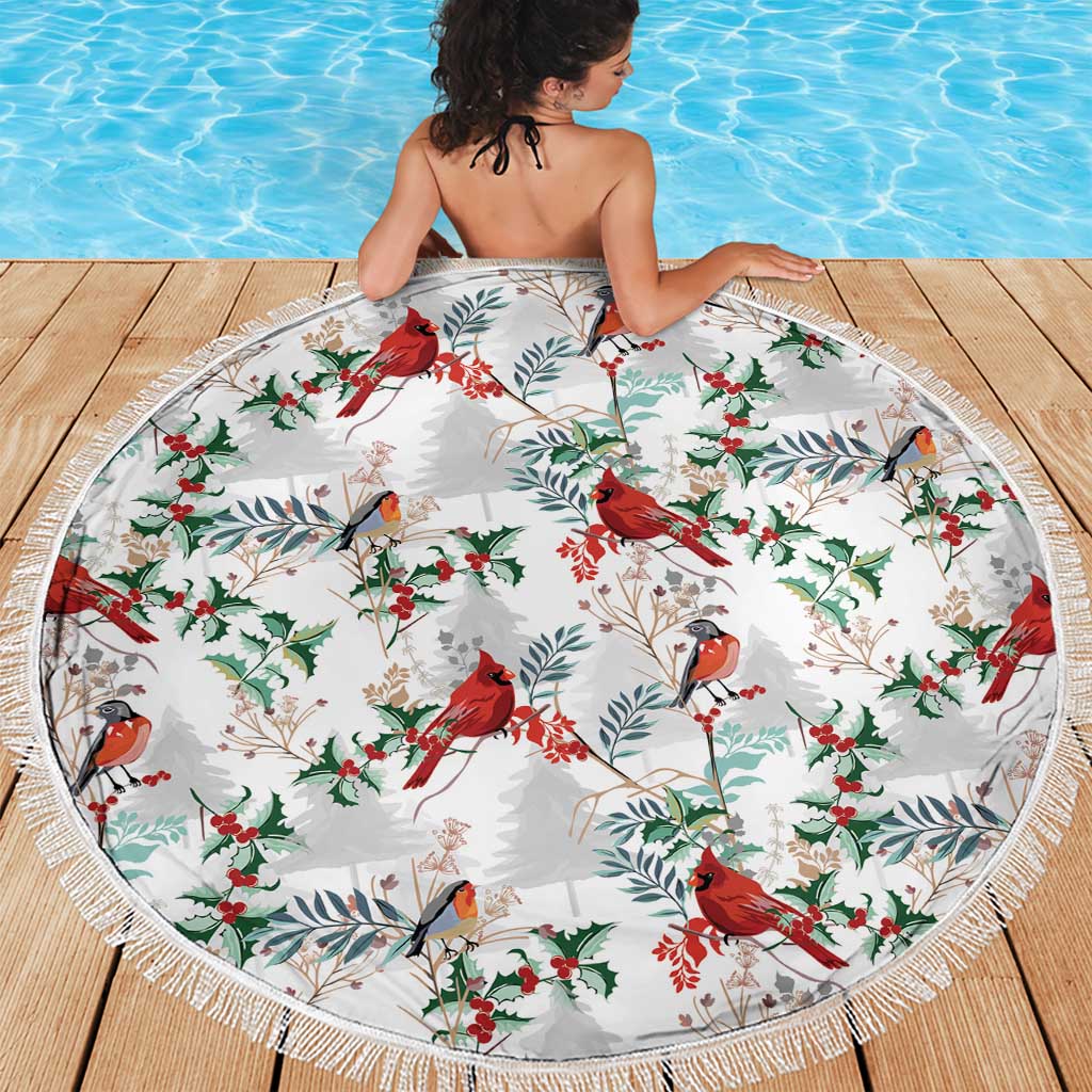 Round beach blanket in white with cardinal, berries, and leaf pattern, tassel fringe edge