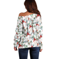 Off-shoulder women’s sweater, white with red cardinal and green leaf print, back view