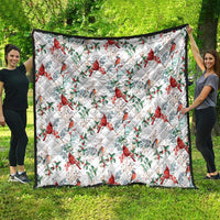 White cardinal Christmas quilt with red birds and green foliage, diamond quilted design