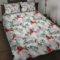 White quilt bed set with cardinal bird and holly leaf pattern; matching square pillow