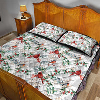 White quilt bed set with cardinal bird and holly leaf pattern, black-trim edges