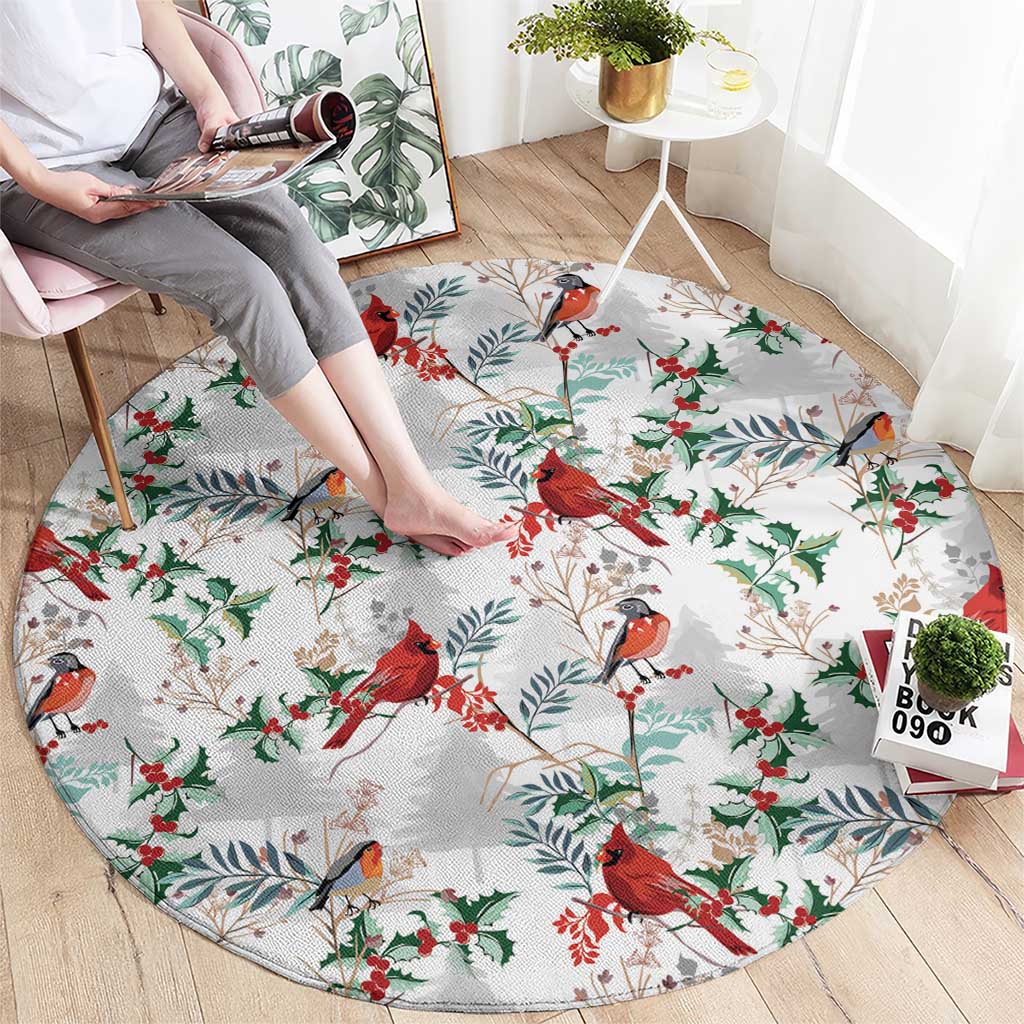 Round Christmas rug with cardinal birds and holly leaves on a light gray base
