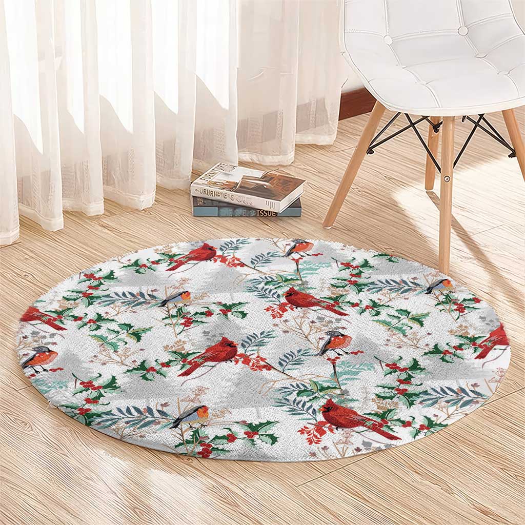 Round Christmas rug with red cardinals and holly leaves on a light gray base