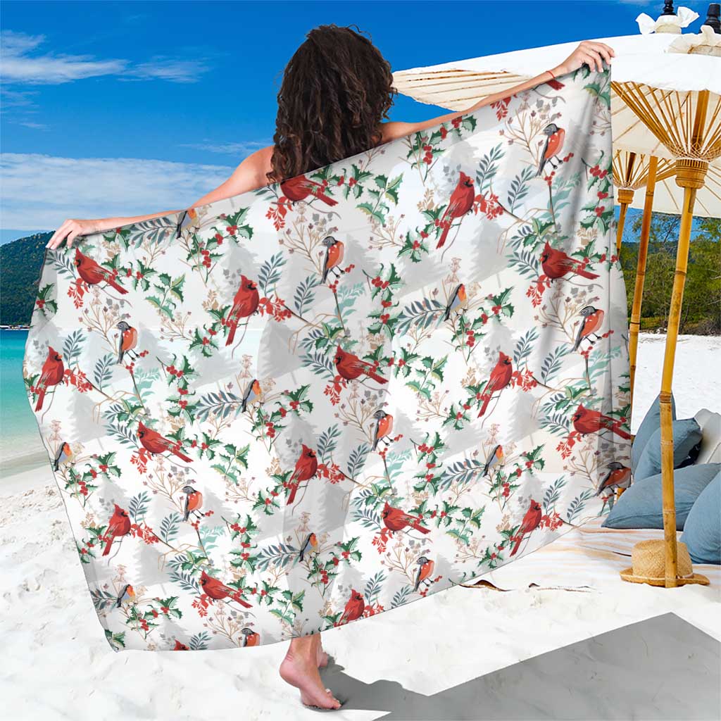 White cardinal Christmas sarong with red birds and green leaf pattern, wrapped