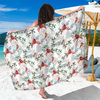 White cardinal Christmas sarong with red birds and green leaf pattern, wrapped