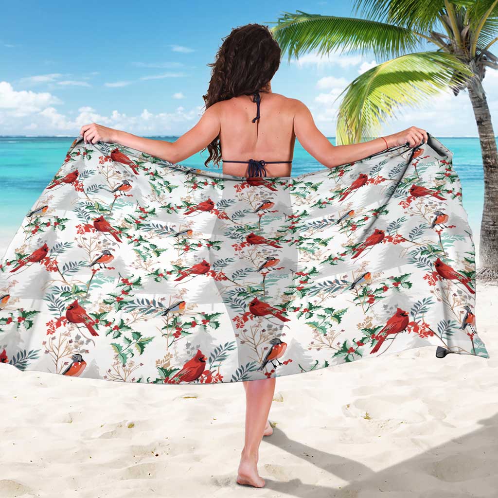 White cardinal Christmas sarong with red birds and green leaves, back tie strings