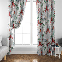 White window curtain with red cardinal and holly leaf print, gathered at the top