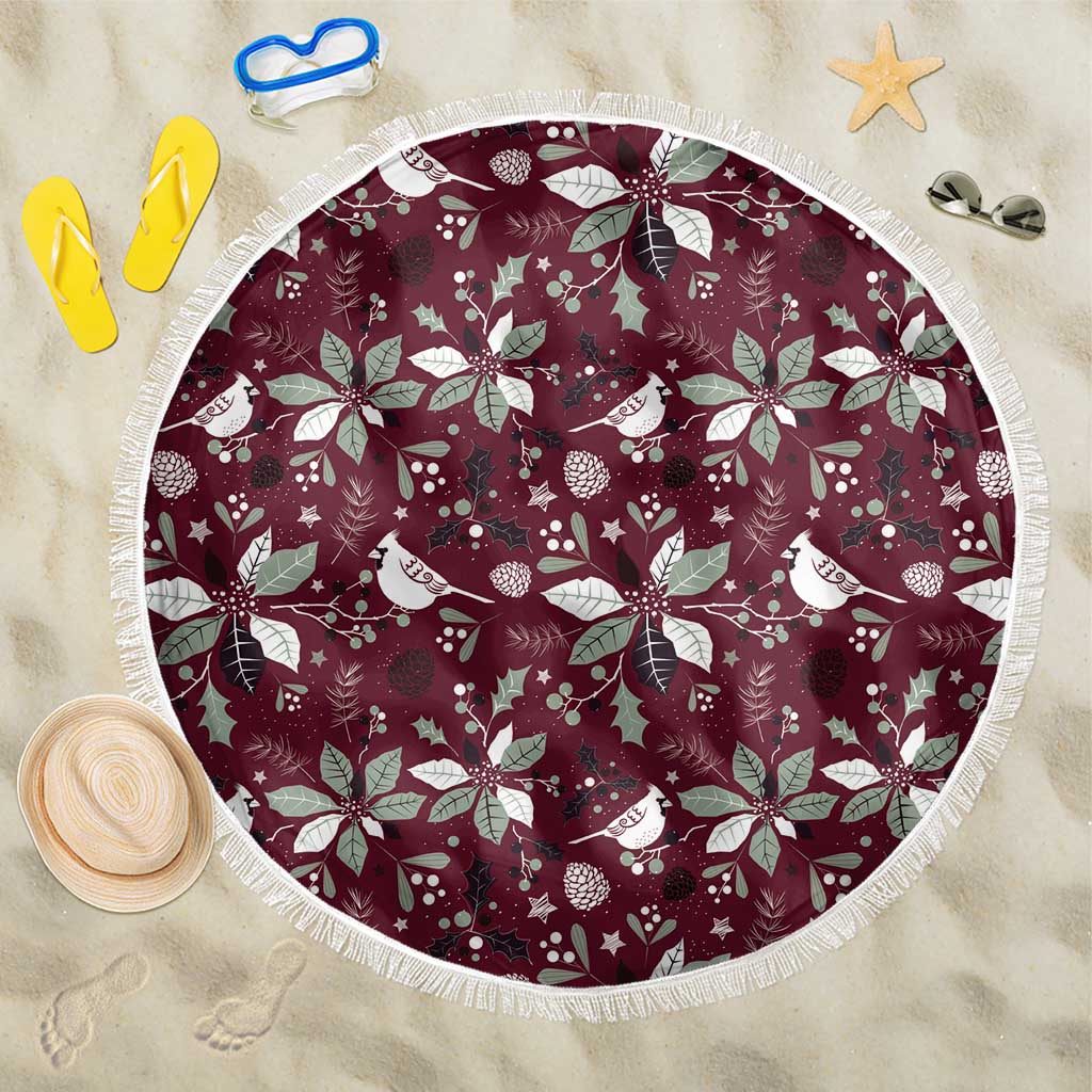 Round wine-red Christmas beach blanket with white bird and holly pattern, fringed edge