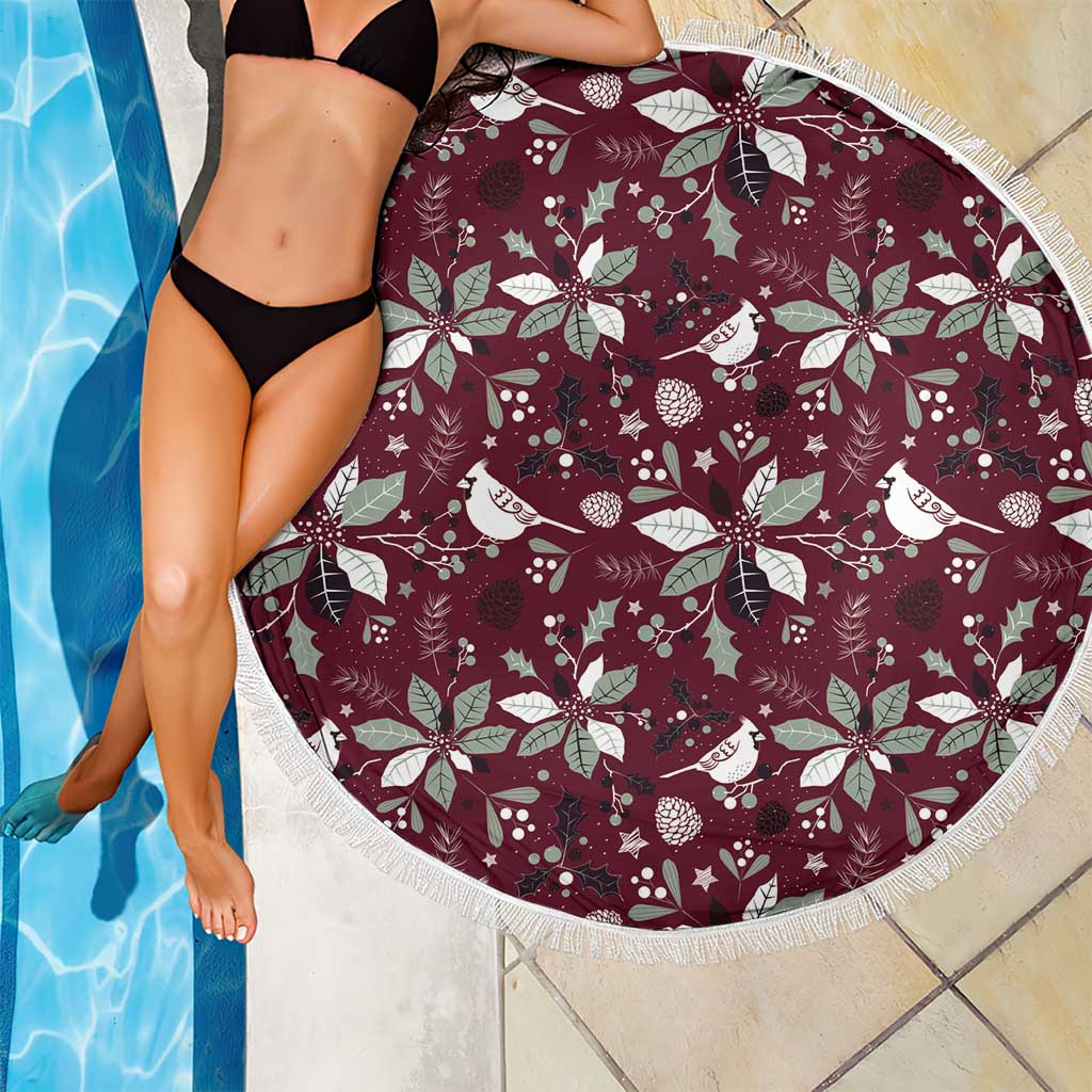 Round wine-red beach blanket with white birds and holly pattern, fringe trim