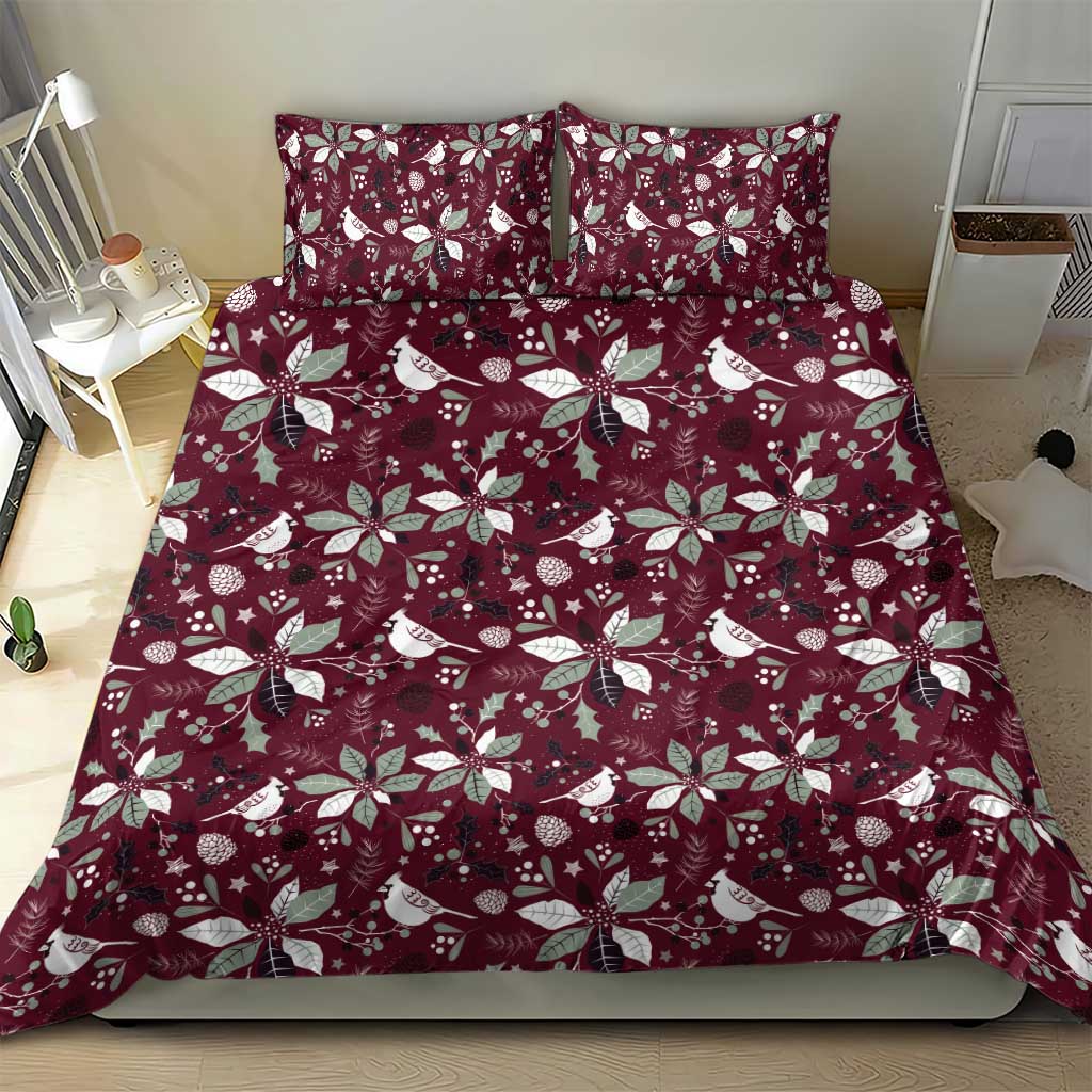 Deep red duvet cover and two pillow shams with white bird and poinsettia Christmas pattern