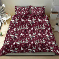 Deep red duvet cover and two pillow shams with white bird and poinsettia Christmas pattern