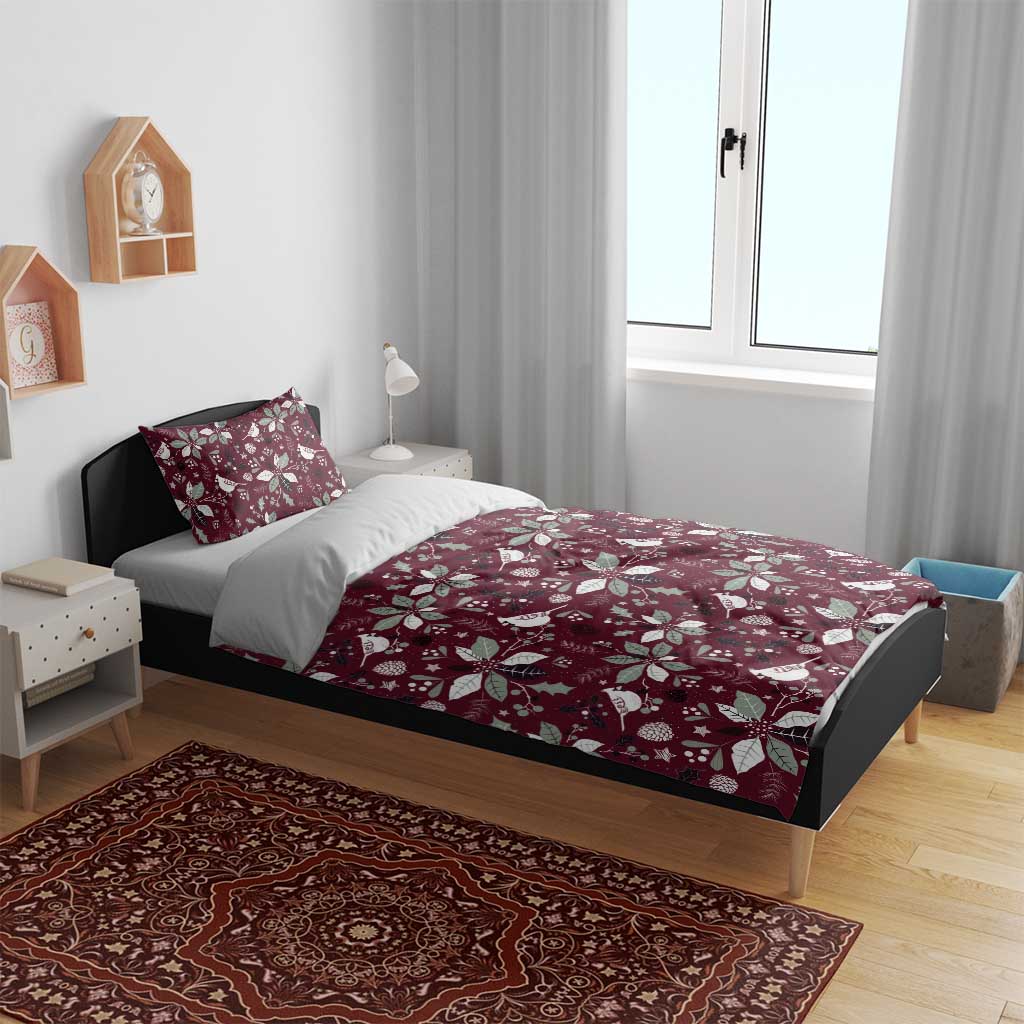 Deep red duvet cover and pillow shams featuring white bird and poinsettia holiday pattern