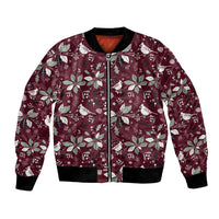 Wine red bomber jacket with Christmas birds, poinsettias, and front zip; black ribbed cuffs