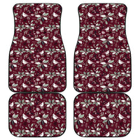 Four wine red car mats with Christmas motif and stitched border edges