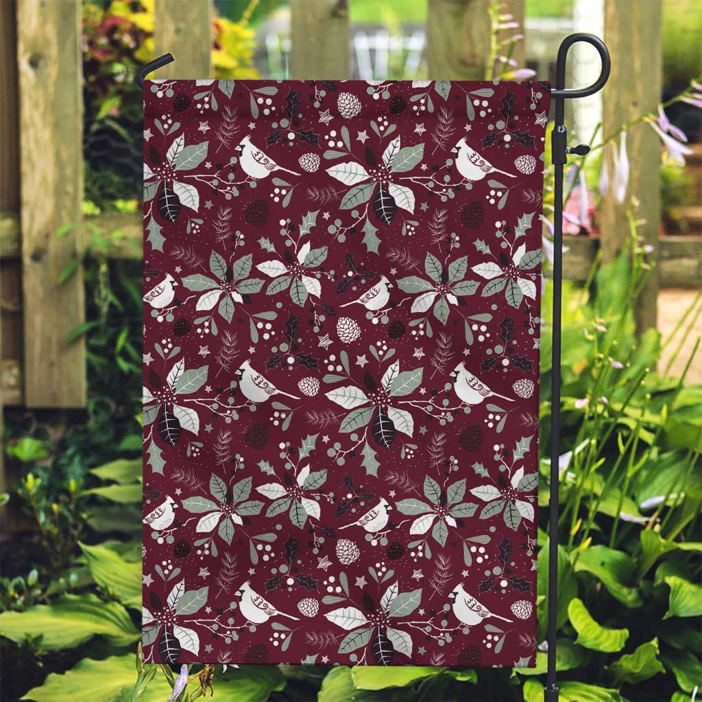 Wine red garden flag on a stand with white poinsettias and birds pattern