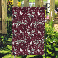 Wine red garden flag on a stand with white poinsettias and birds pattern