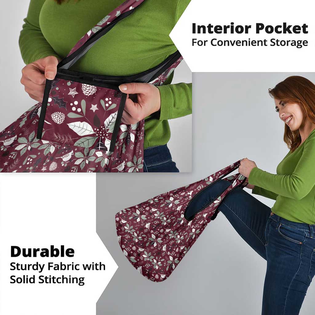 Wine red holiday tote bag with white botanical pattern and visible interior pocket section