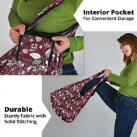 Wine red holiday tote bag with white botanical pattern and visible interior pocket section