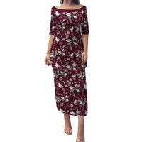 Wine red long dress with short sleeves, scoop neck, and festive leaf pattern
