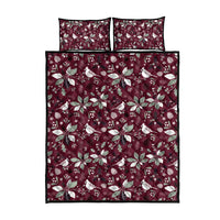 Wine red quilt bed set with holly leaf and bird pattern, two square pillow shams shown