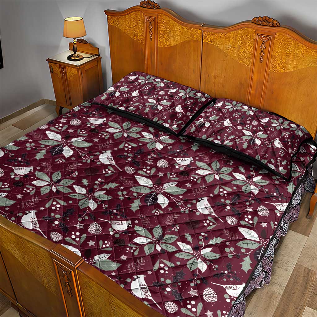 Wine red quilt bed set with holly leaf and bird motif, quilt top and pillow shams visible