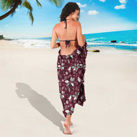 Wine-red holiday floral sarong wrap dress, tied at neck and waist