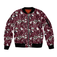 Wine red unisex bomber jacket with full zip, ribbed black cuffs, and holiday pattern