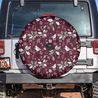 Maroon circular spare tire cover with white Christmas wreath and bird pattern
