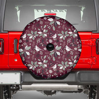 Maroon circular spare tire cover with white Christmas wreath and bird pattern