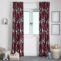 Wine red window curtain panels with repeating white holiday leaf and ornament motif