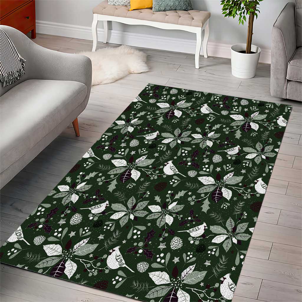 Rectangular green area rug with bold holiday leaf and flower print, white and purple accents